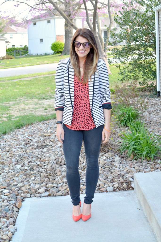 Ashley from LSR in a striped blazer, printed blouse, and bright pumps