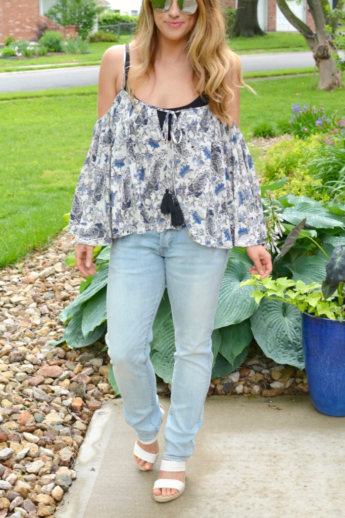 Ashley form LSR in a boho off-the-shoulder top and men's H&M jeans