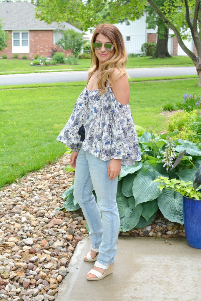 Ashley form LSR in a boho off-the-shoulder top and men's H&M jeans