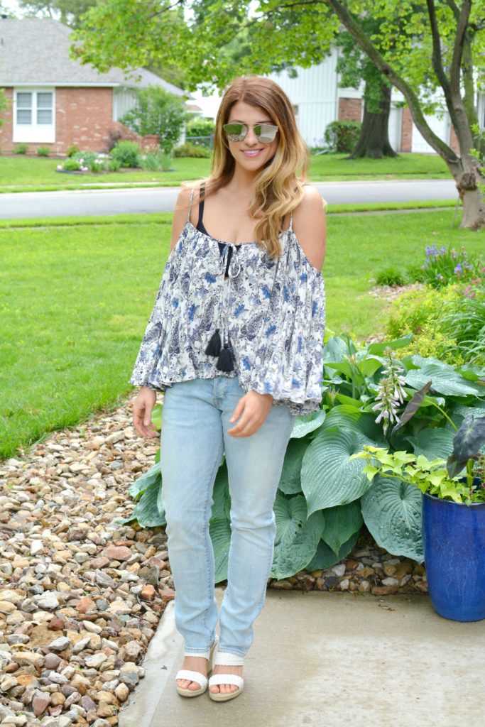 Ashley form LSR in a boho off-the-shoulder top and men's H&M jeans