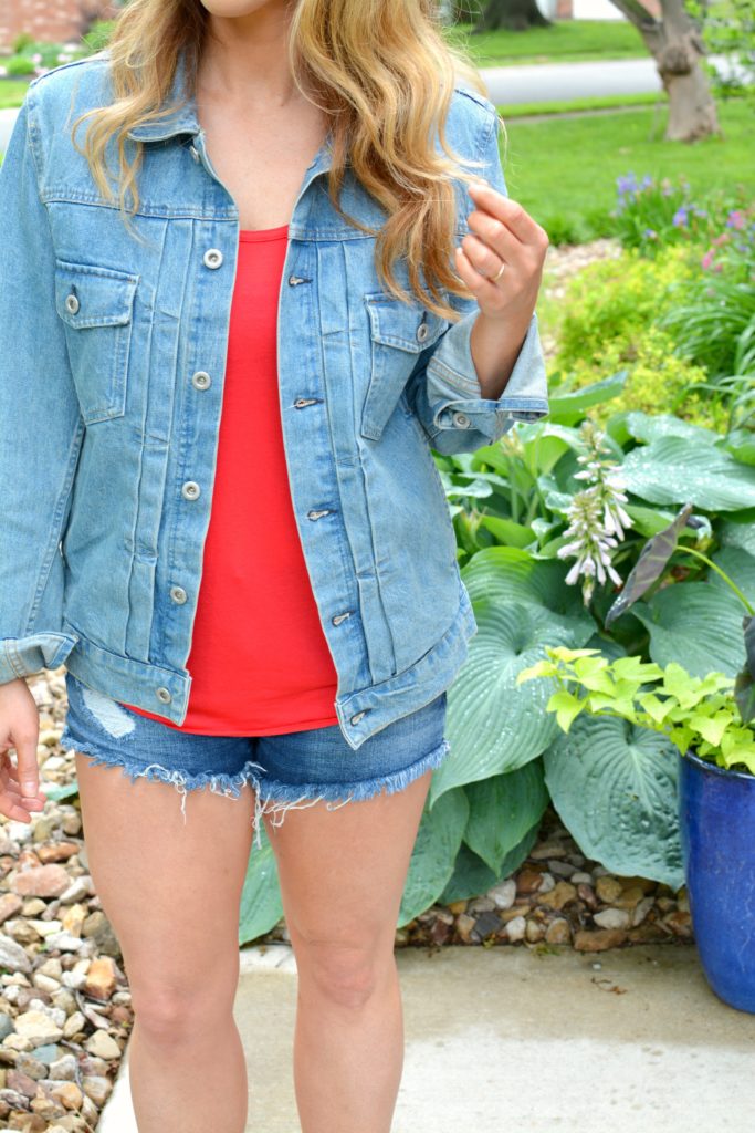Ashley from LSR in a men's denim jacket and cutoff shorts