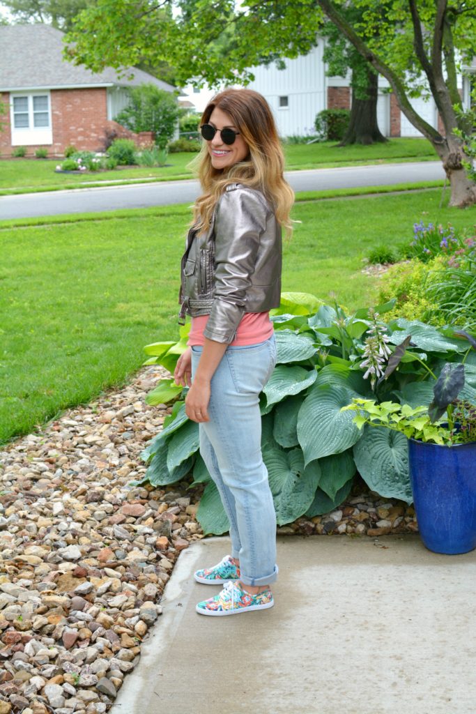 Ashley from LSR in a silver moto jacket, men's H&M denim, and floral sneakers