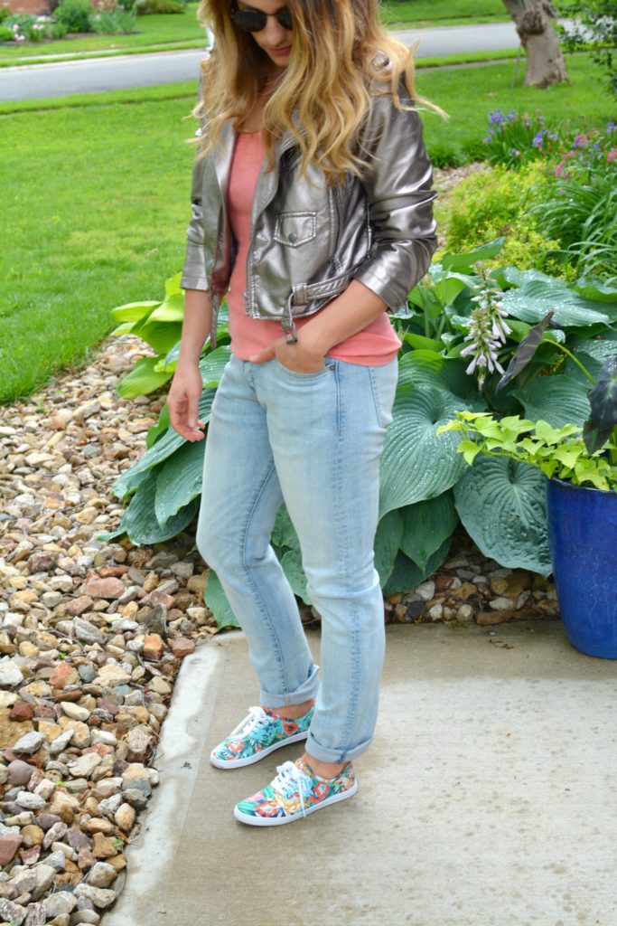 Ashley from LSR in a silver moto jacket, men's H&M denim, and floral sneakers