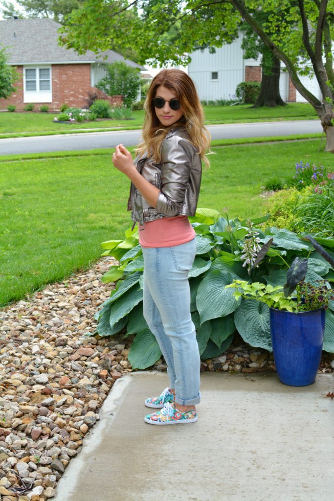 Ashley from LSR in a silver moto jacket, men's H&M denim, and floral sneakers