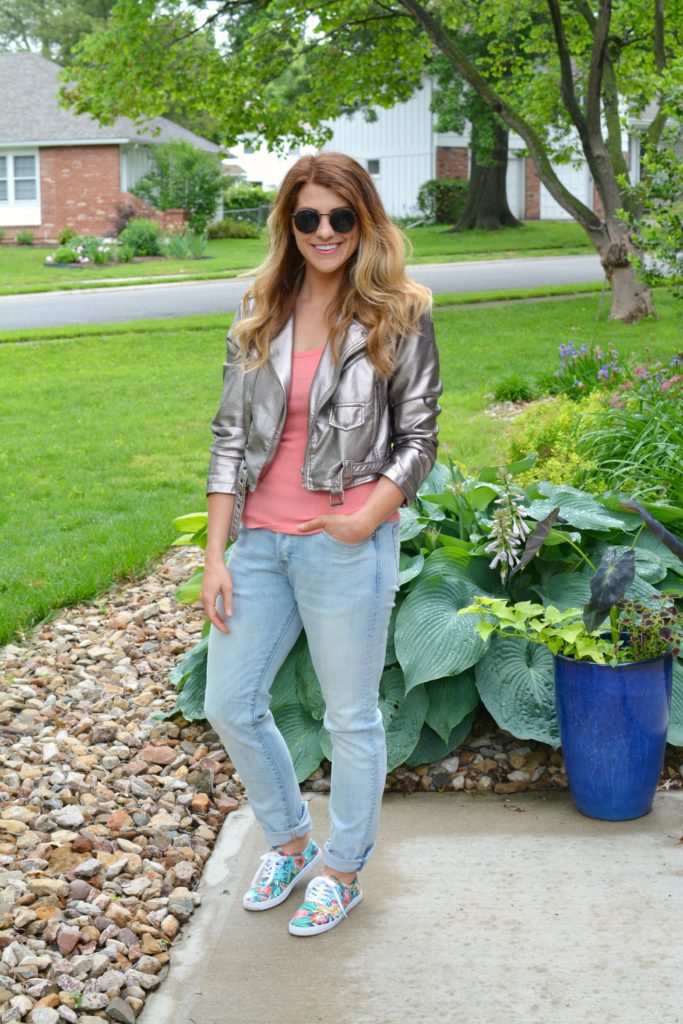 Ashley from LSR in a silver moto jacket, men's H&M denim, and floral sneakers