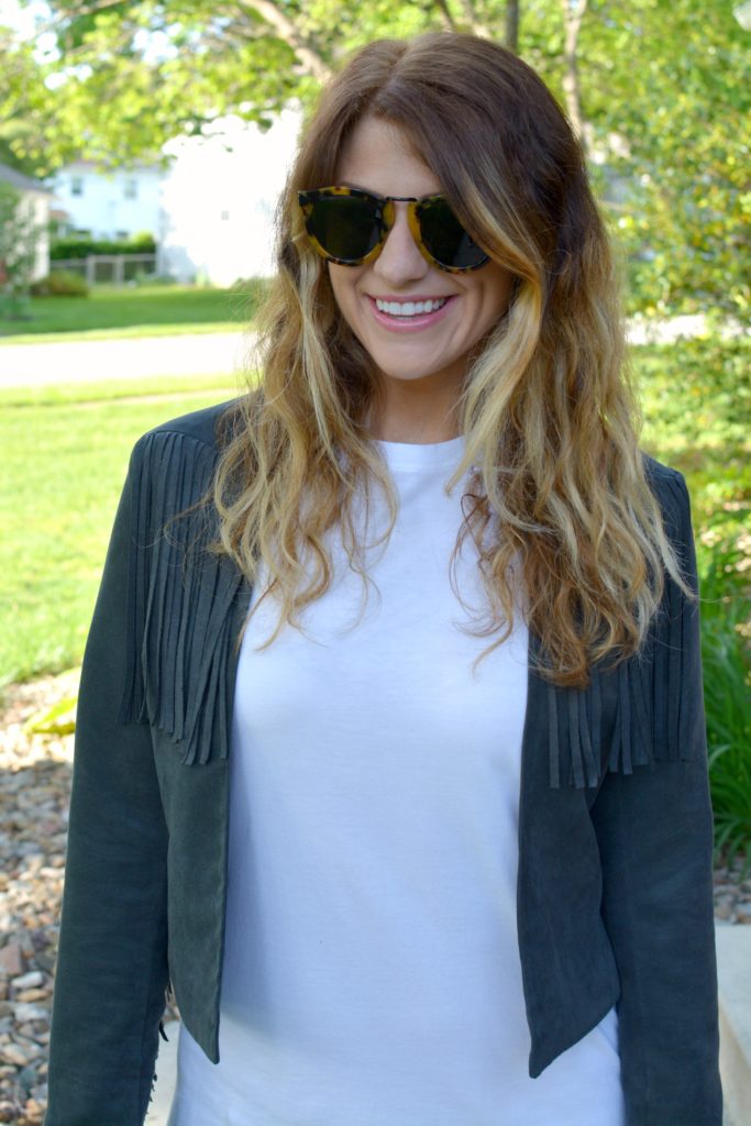 Ashley from LSR in a t-shirt dress and fringe suede jacket