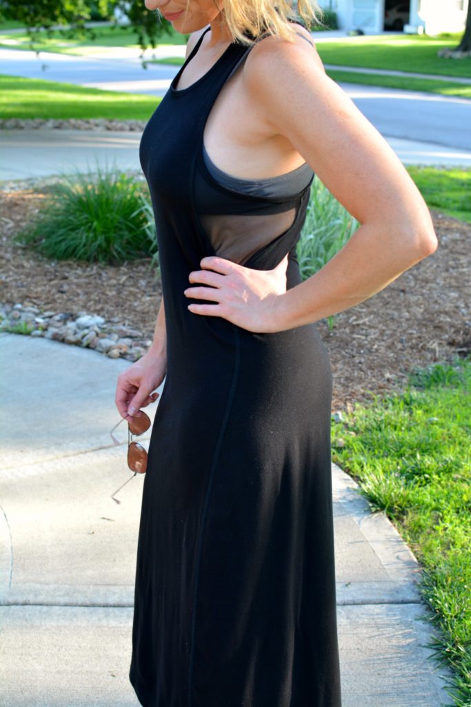 Ashley from LSR in a black ALALA dress