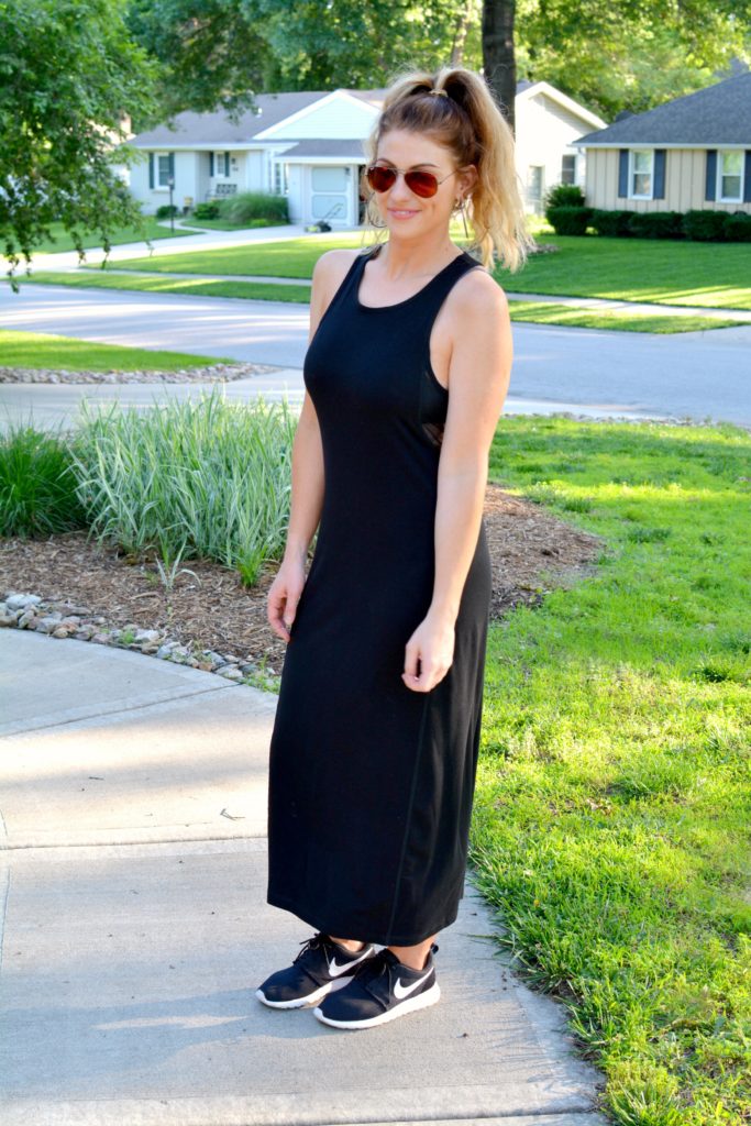 Ashley from LSR in a black ALALA dress and Nike sneakers