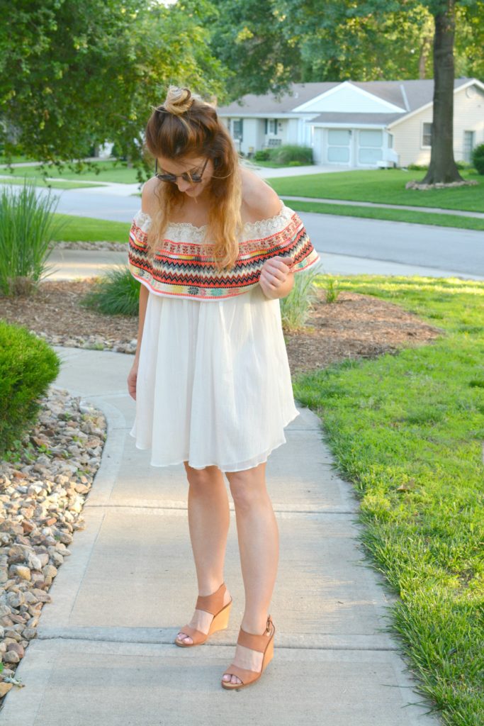 Ashley from LSR in an off-the-shoulder embroidered dress with leather wedges