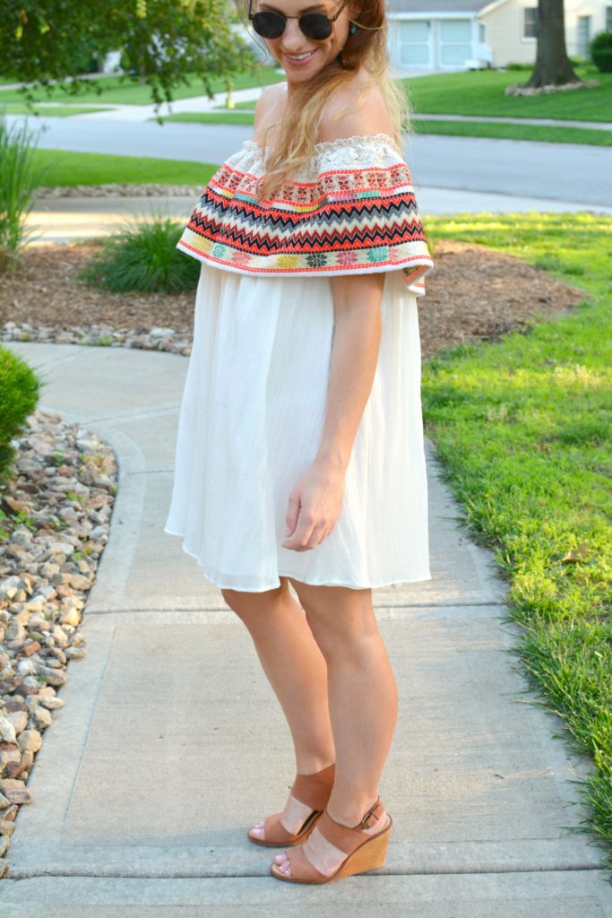 Ashley from LSR in an off-the-shoulder embroidered dress with leather wedges