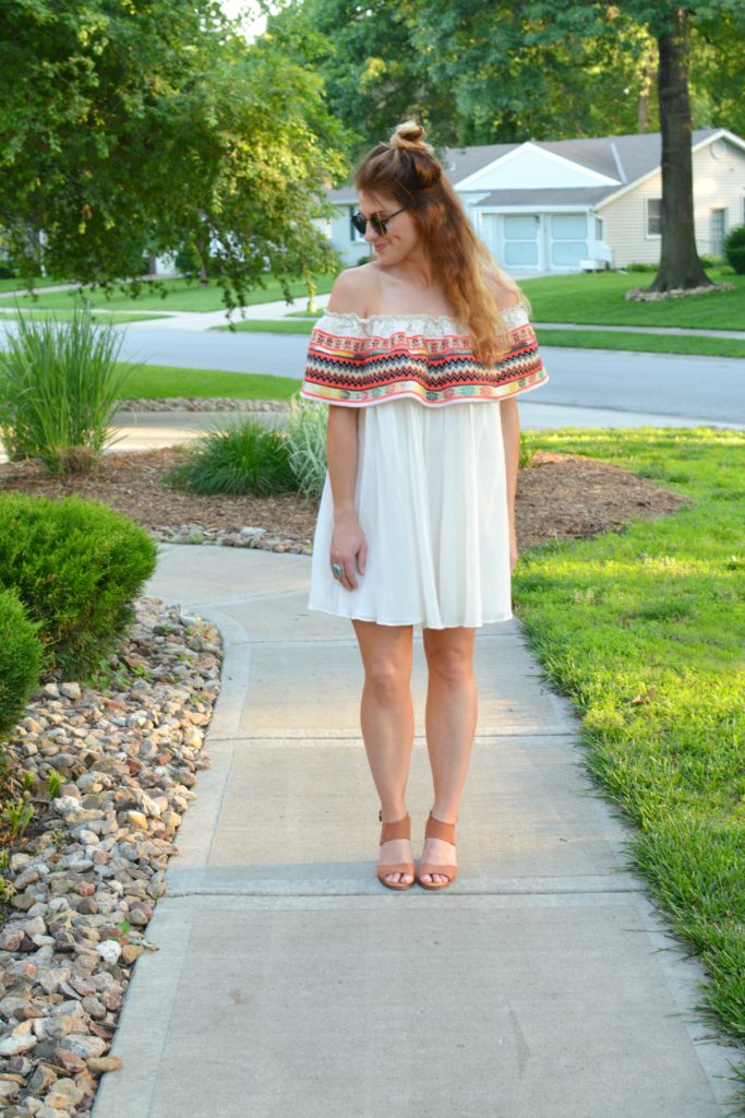 Ashley from LSR in an off-the-shoulder embroidered dress with leather wedges