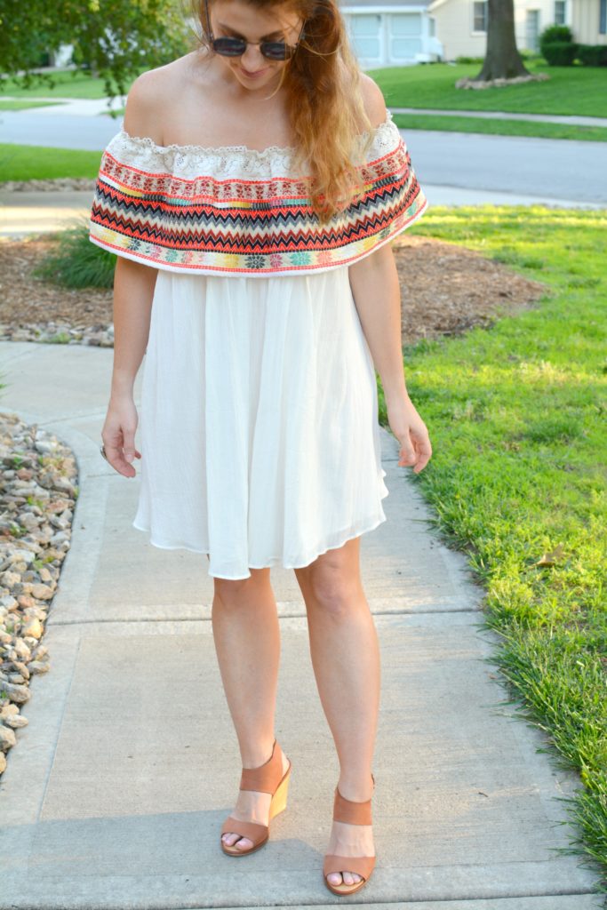 Ashley from LSR in an off-the-shoulder embroidered dress with leather wedges