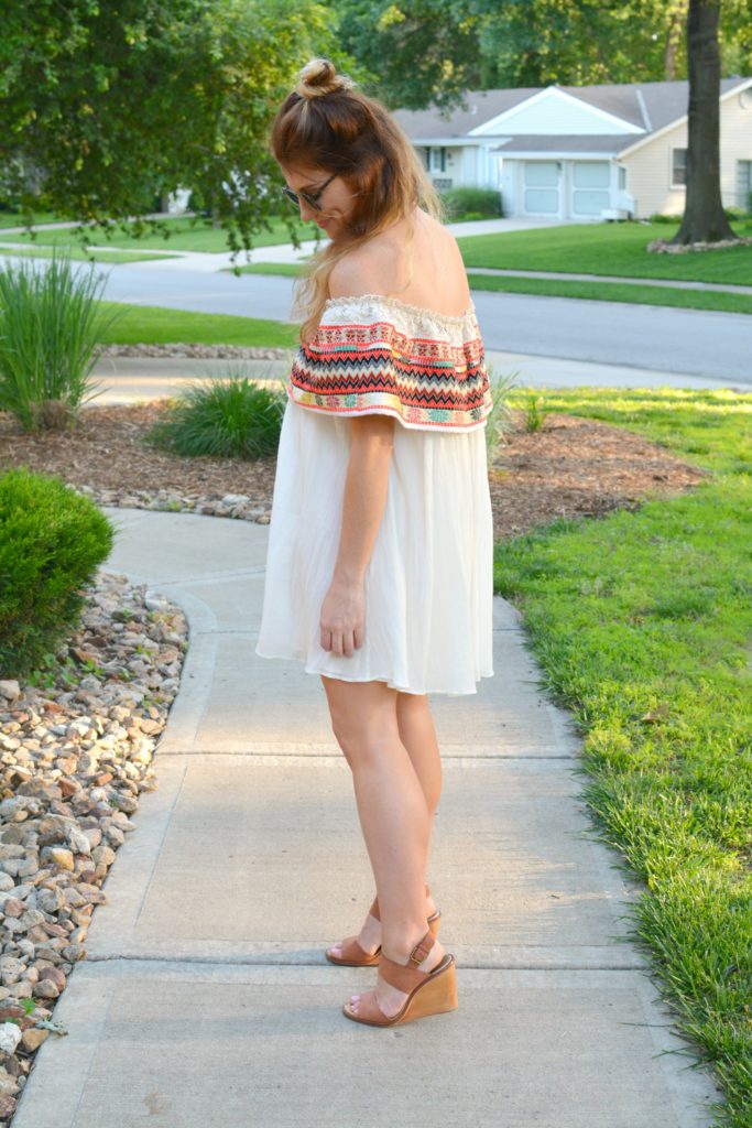 Ashley from LSR in an off-the-shoulder embroidered dress with leather wedges