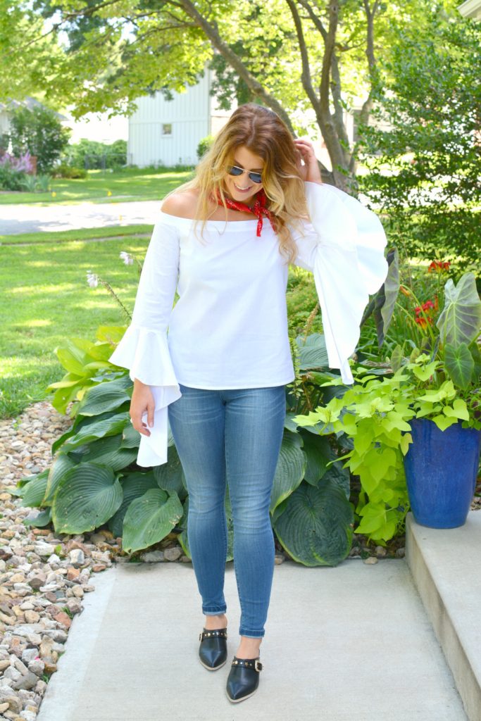 Ashley from LSR in a white off-the-shoulder statement blouse and The Limited denim, with leather mules