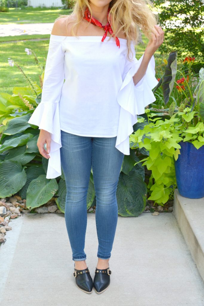 Ashley from LSR in a white off-the-shoulder statement blouse and The Limited denim, with leather mules