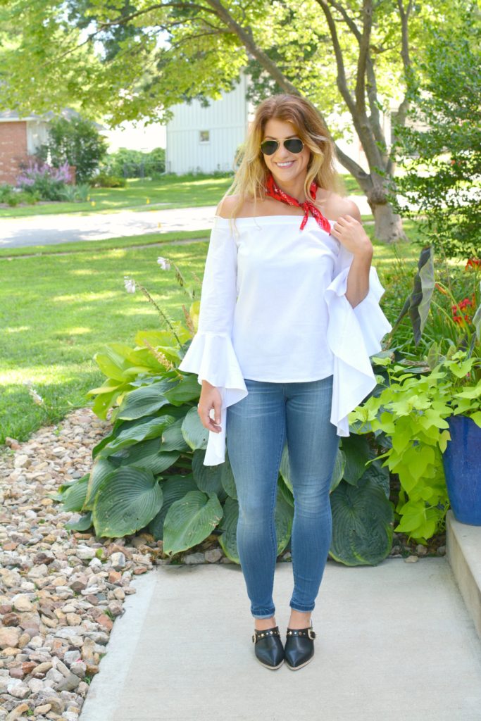 Ashley from LSR in a white off-the-shoulder statement blouse and The Limited denim, with leather mules