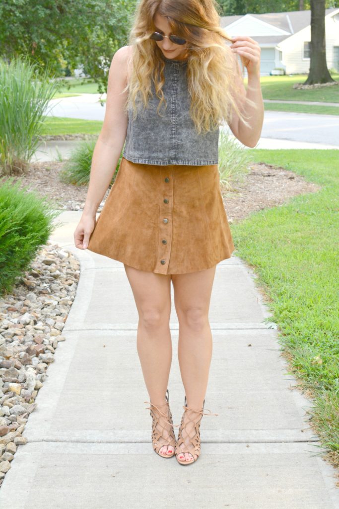 Ashley from LSR in an acid wash crop top and faux suede skirt