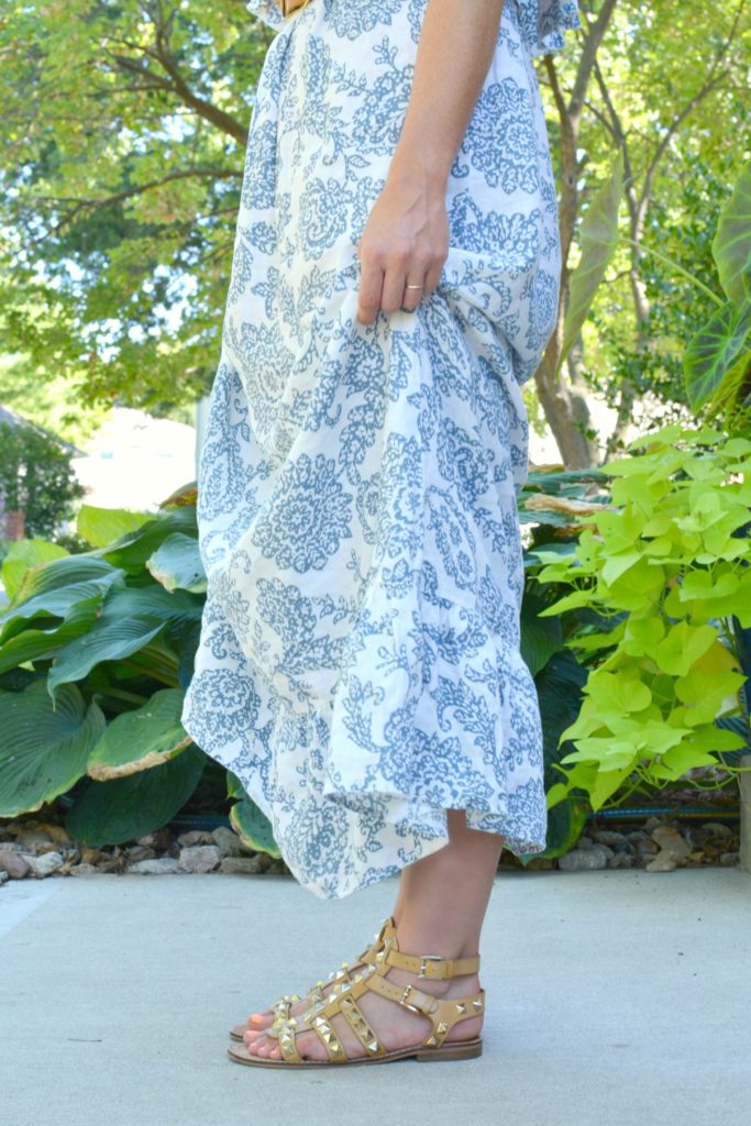 Ashley from LSR in a printed linen maxi dress and studded sandals