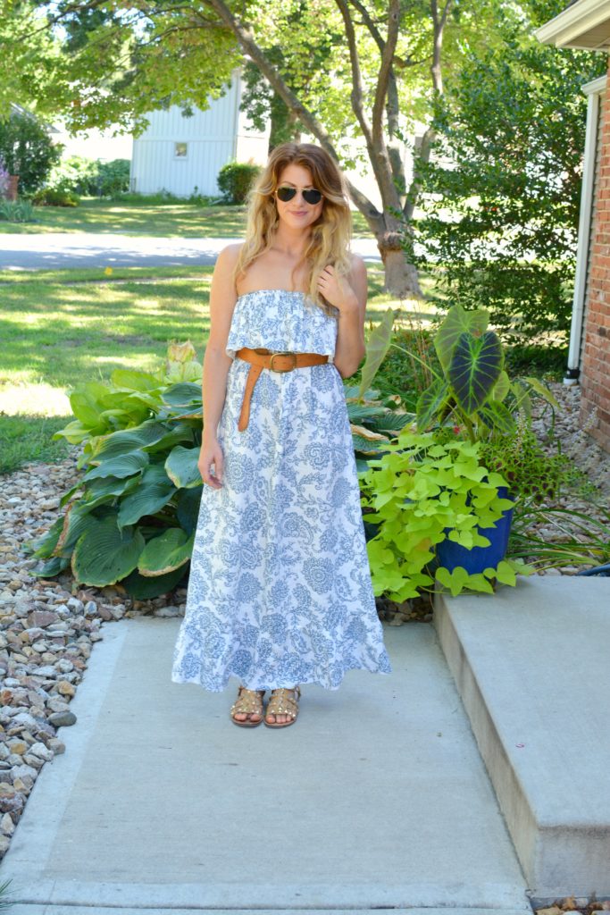 Ashley from LSR in a printed linen maxi dress, linea pelle belt, and studded sandals