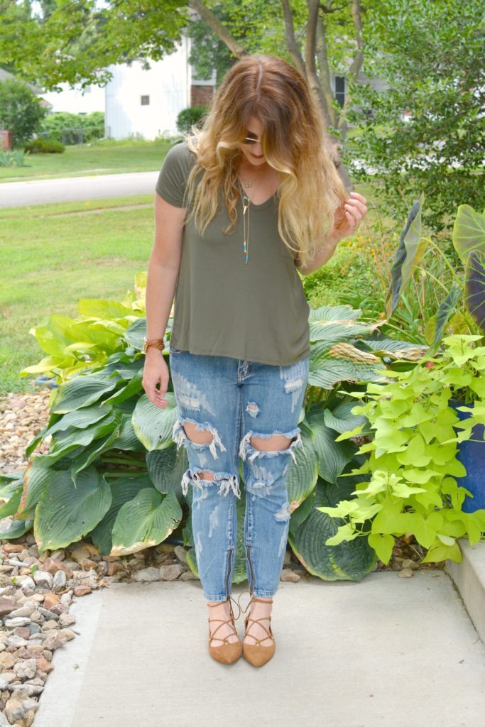 Ashley from LSR in an olive green tee and One Teaspoon jeans