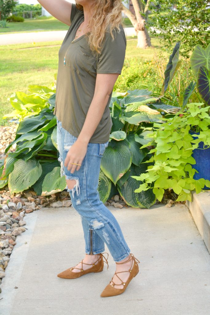 Ashley from LSR in an olive green tee and One Teaspoon jeans