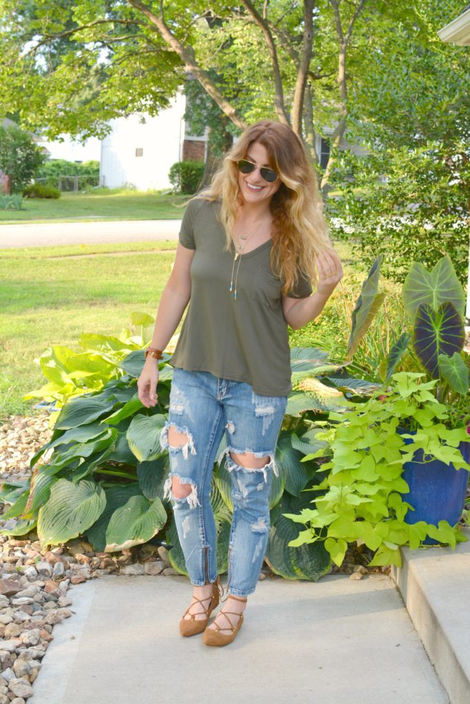 Ashley from LSR in an olive green tee and One Teaspoon jeans