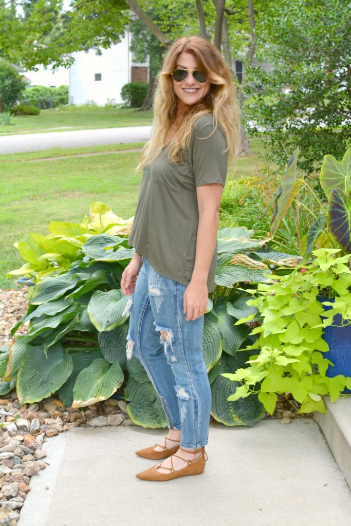 Ashley from LSR in an olive green tee and One Teaspoon jeans