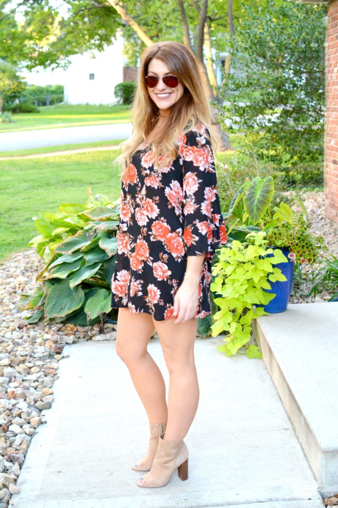 Ashley from LSR in a dark floral dress and sam edelman suede booties