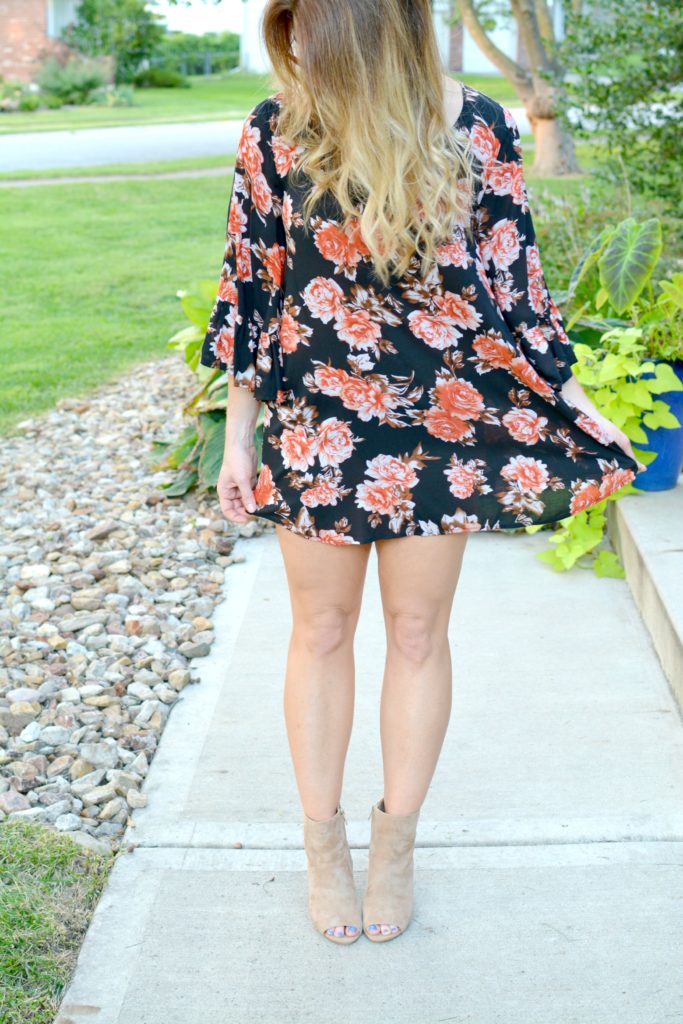 Ashley from LSR in a dark floral dress and sam edelman suede booties