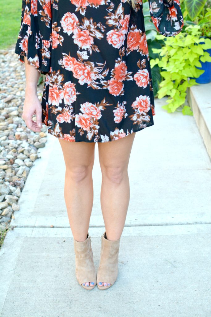 Ashley from LSR in a dark floral dress and sam edelman suede booties