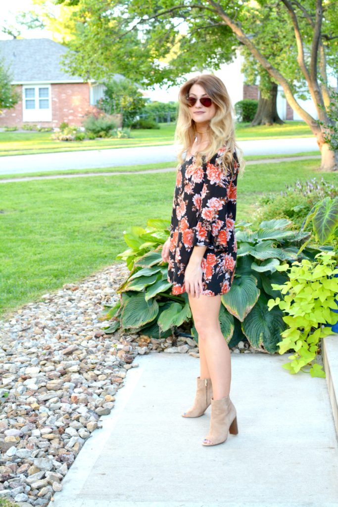 Ashley from LSR in a dark floral dress and sam edelman suede booties