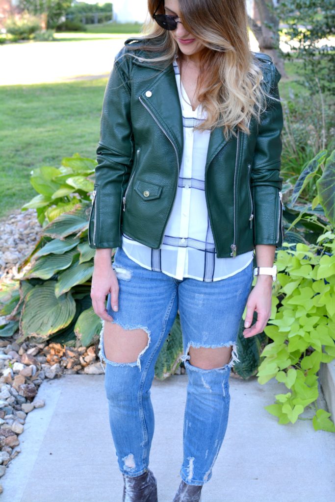 Ashley from LSR in a green leather jacket, destroyed denim, and velvet booties