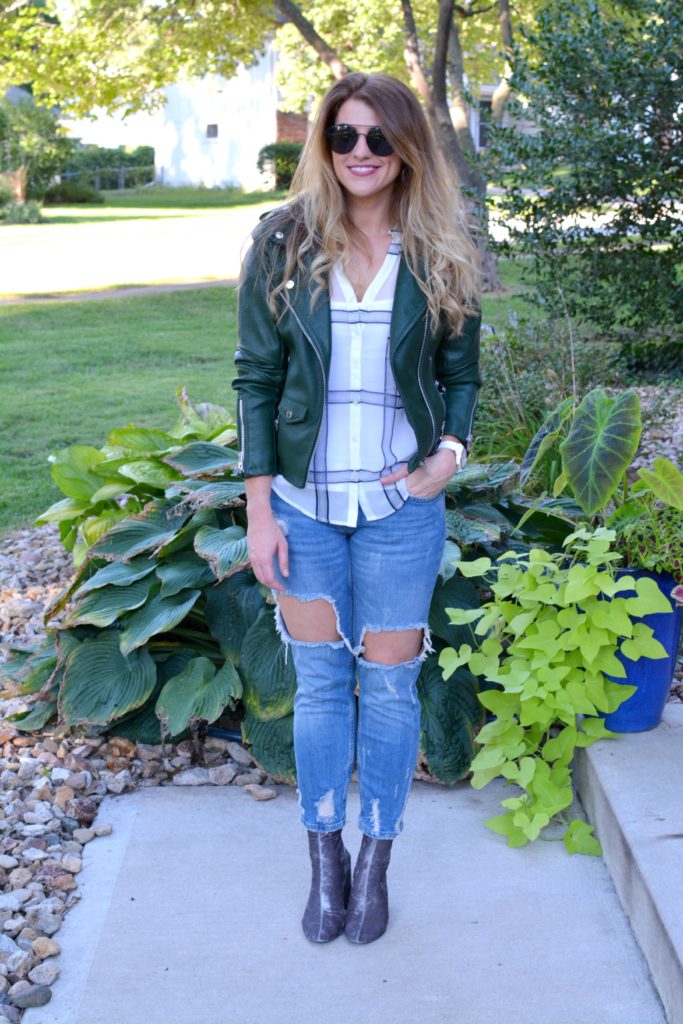 Ashley from LSR in a green leather jacket, destroyed denim, and velvet booties