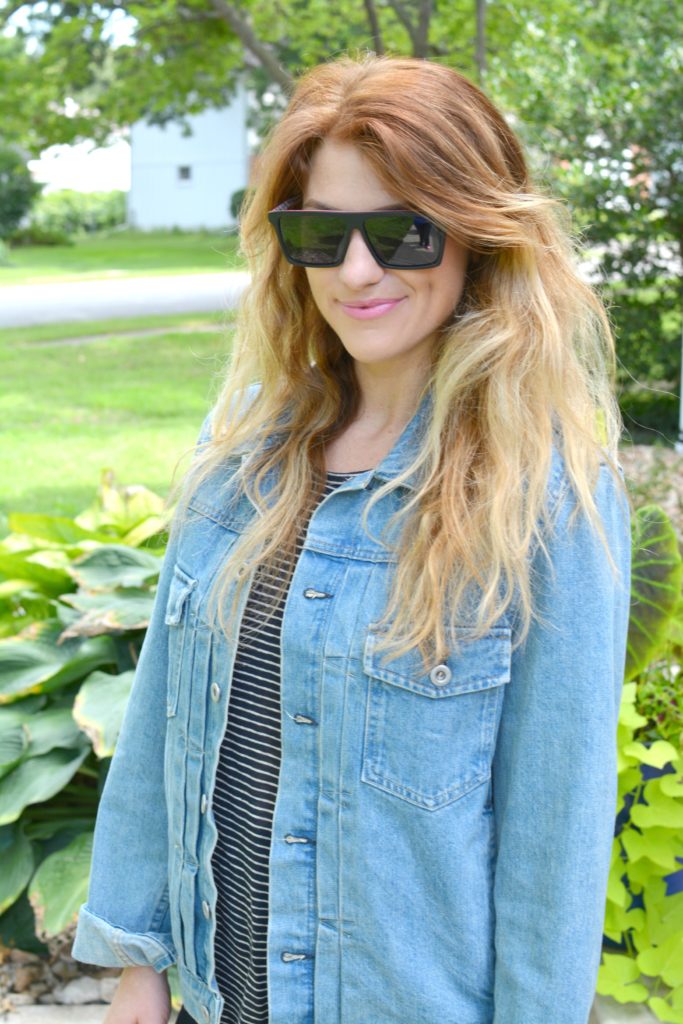 Ashley from LSR in a men's boxy denim jean jacket with a striped tee