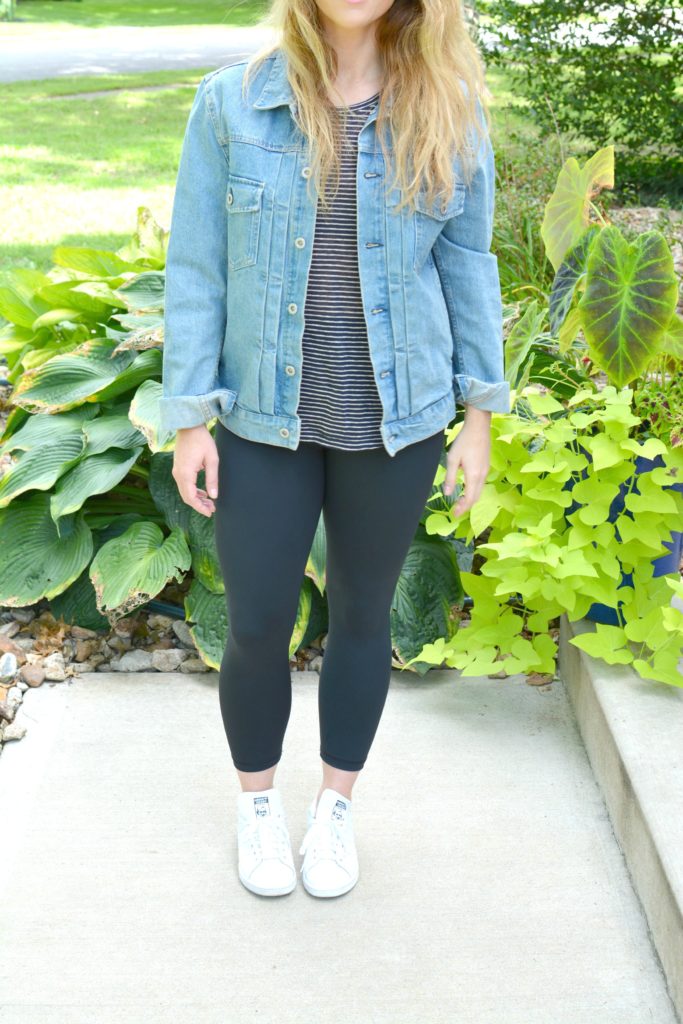 Ashley from LSR in a men's boxy denim jean jacket, striped tee, Carbon38 leggings, and Stan Smith sneakers