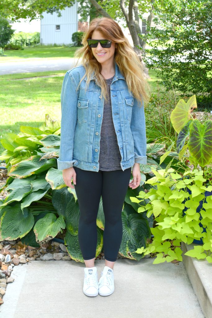 Ashley from LSR in a men's boxy denim jean jacket, striped tee, Carbon38 leggings, and Stan Smith sneakers