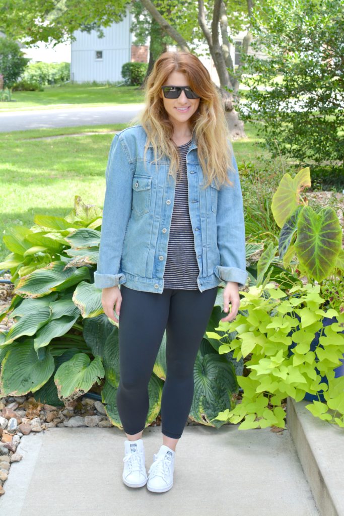 Ashley from LSR in a men's boxy denim jean jacket, striped tee, Carbon38 leggings, and Stan Smith sneakers