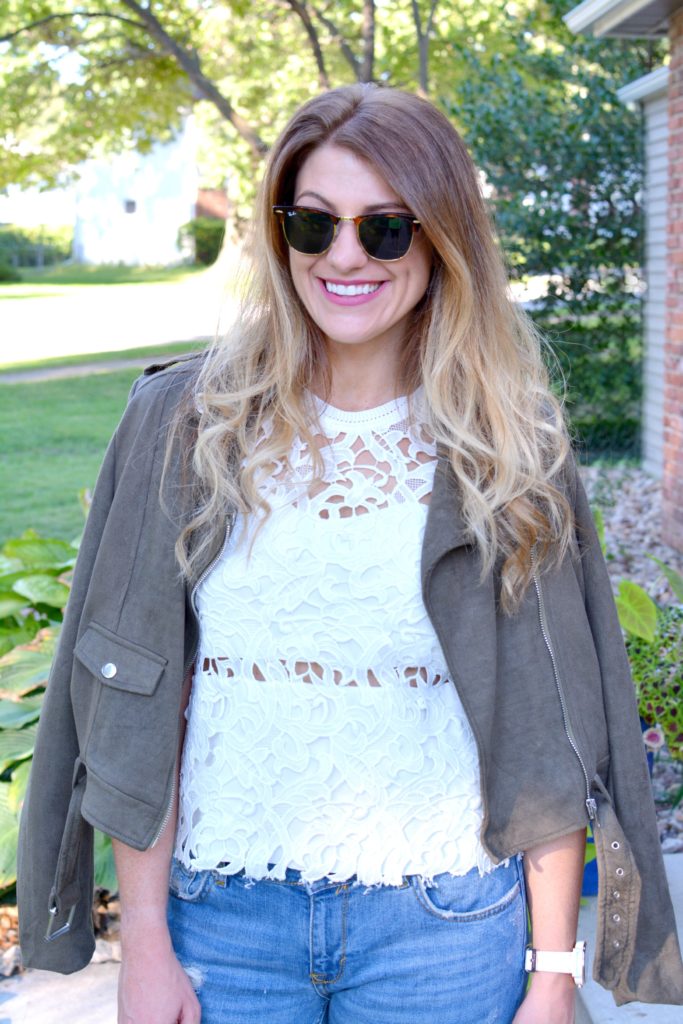 Ashley from LSR in a suede jacket and lace top