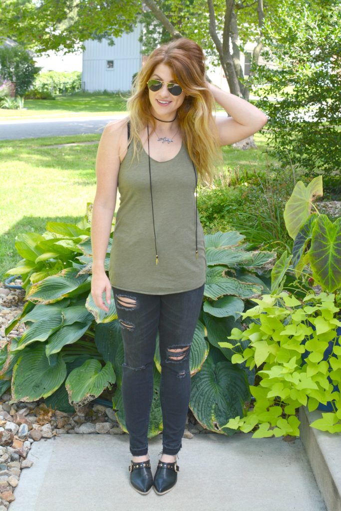 Ashley from LSR in black shredded jeans, leather mules, and a Vanessa Mooney choker