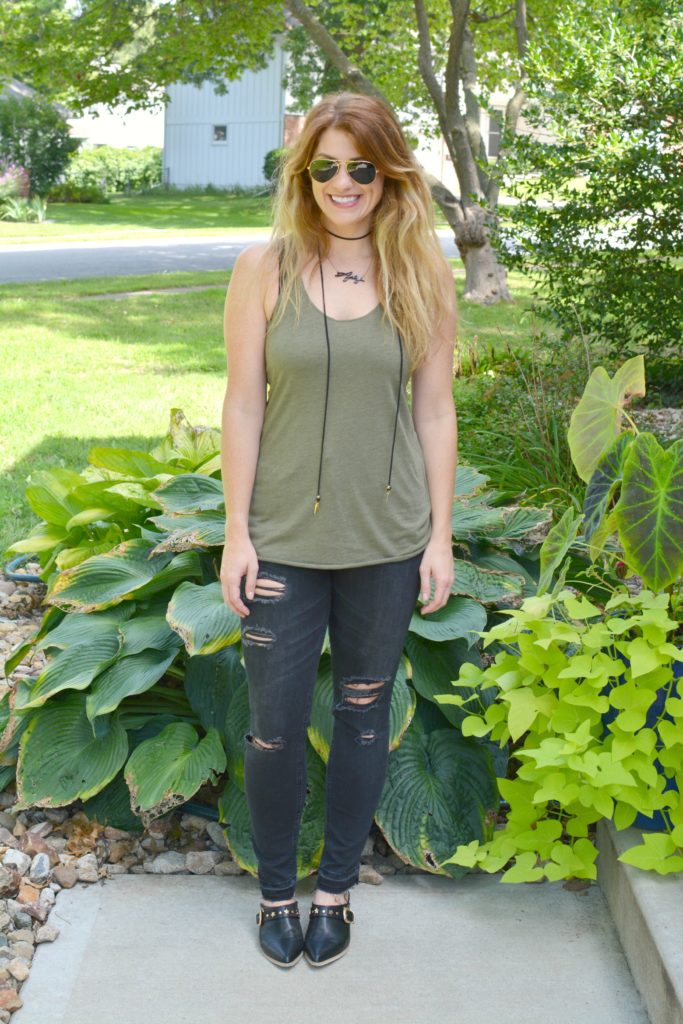 Ashley from LSR in black shredded jeans, leather mules, and a Vanessa Mooney choker
