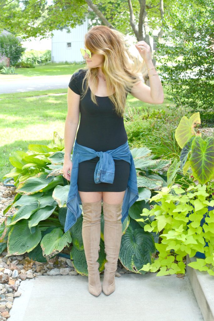 Ashley from LSR in a black t-shirt dress, nude suede thigh high boots, and a chambray shirt