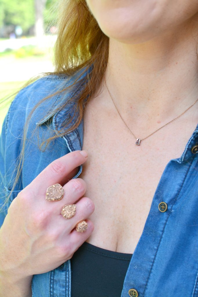 Ashley from LSR in a chambray shirt, Kendra Scott ring, and initial necklace