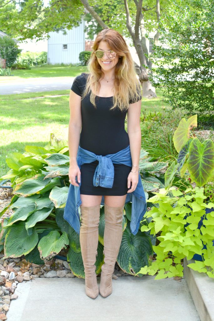 Ashley from LSR in a black t-shirt dress, nude suede thigh high boots, and a chambray shirt