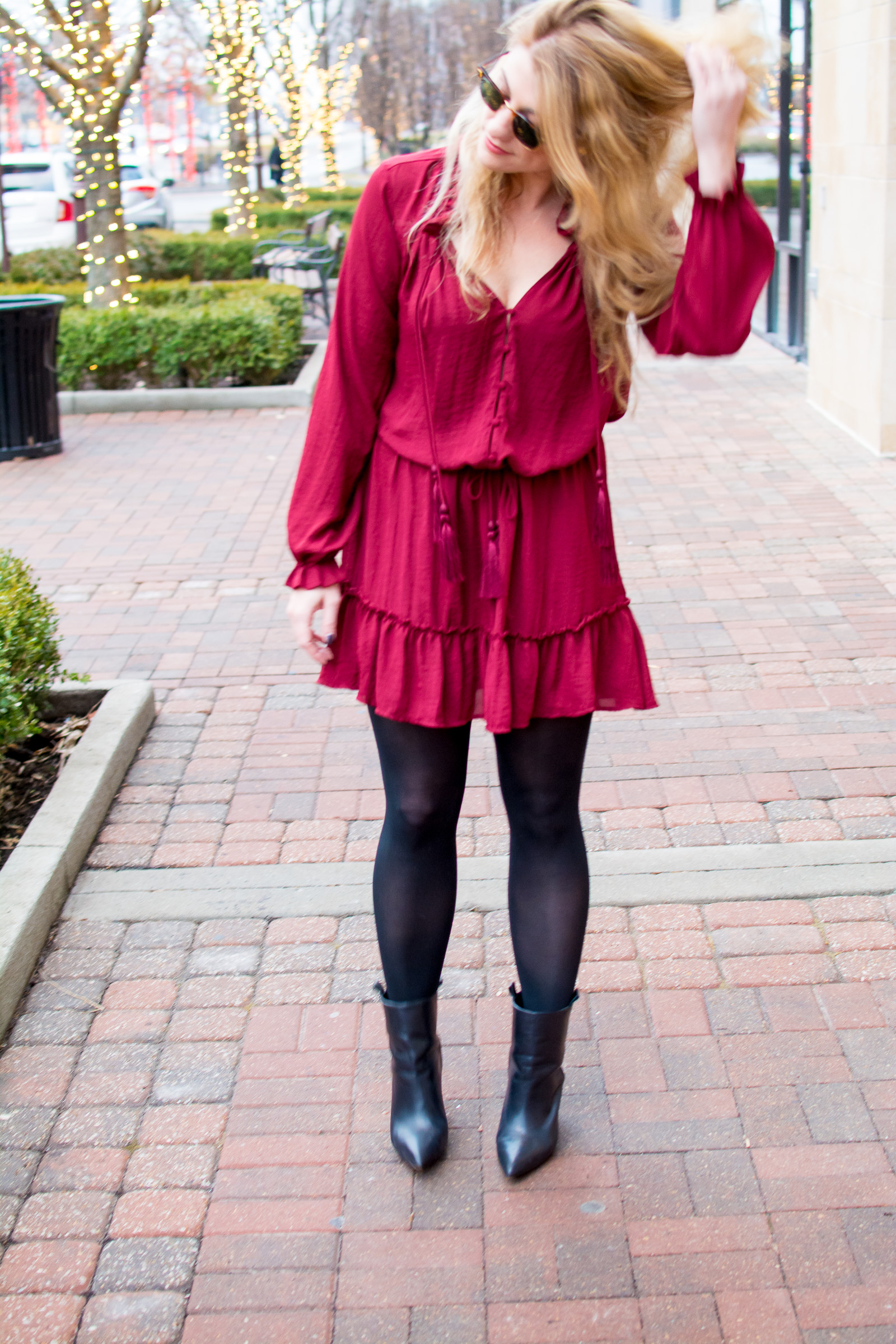 Red dress with store black tights and boots