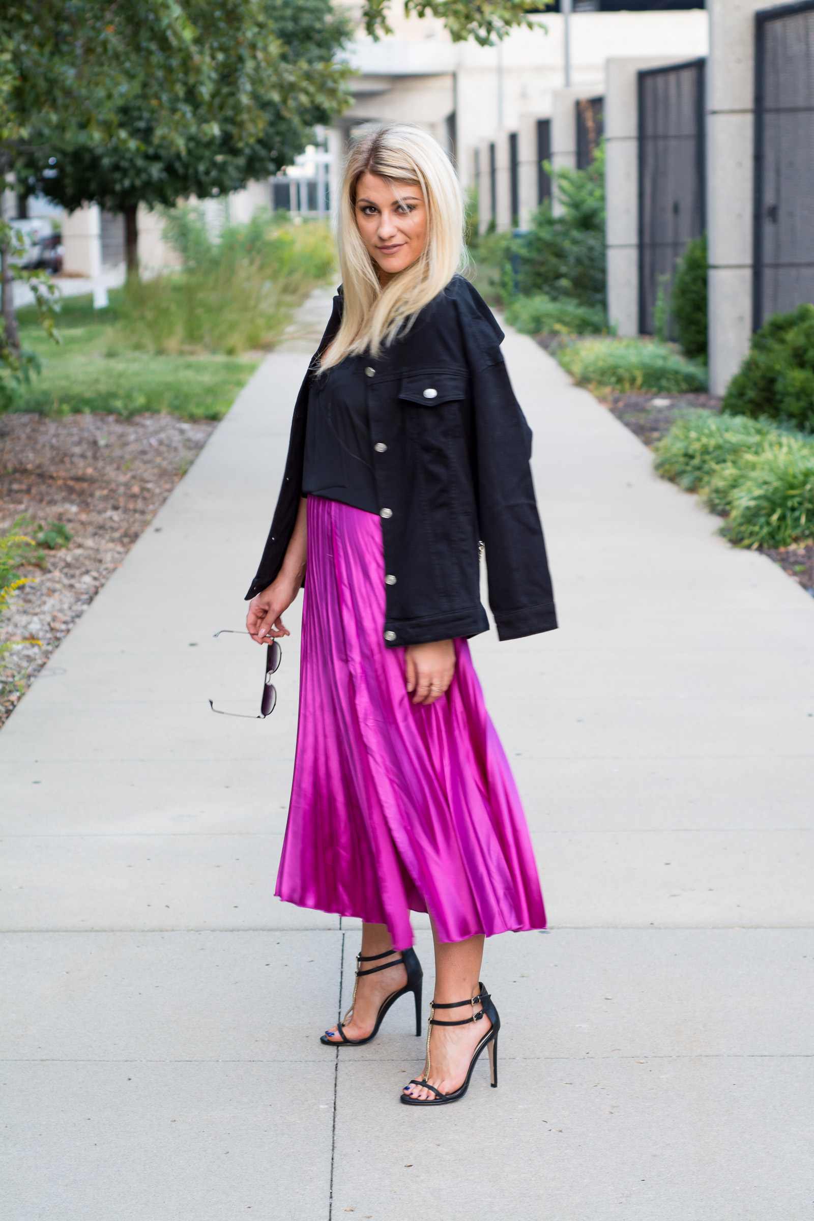 Fuchsia Pleated Midi Skirt + Black Denim Chain Jacket. | Ashley from LSR