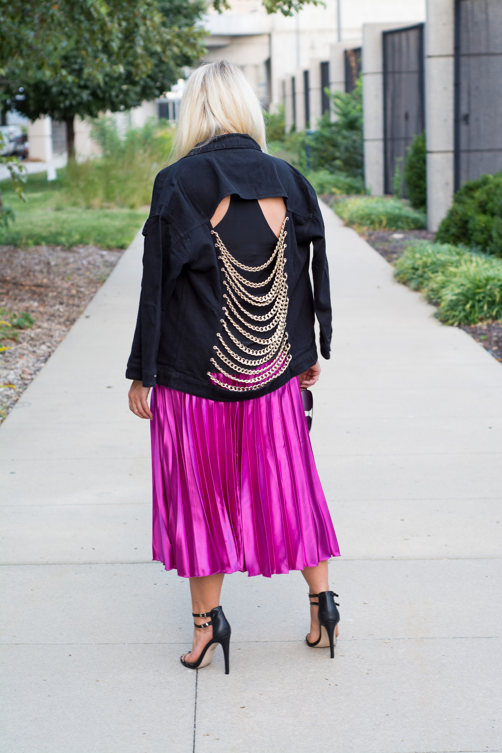 Fuchsia Pleated Midi Skirt + Black Denim Chain Jacket. | Ashley from LSR