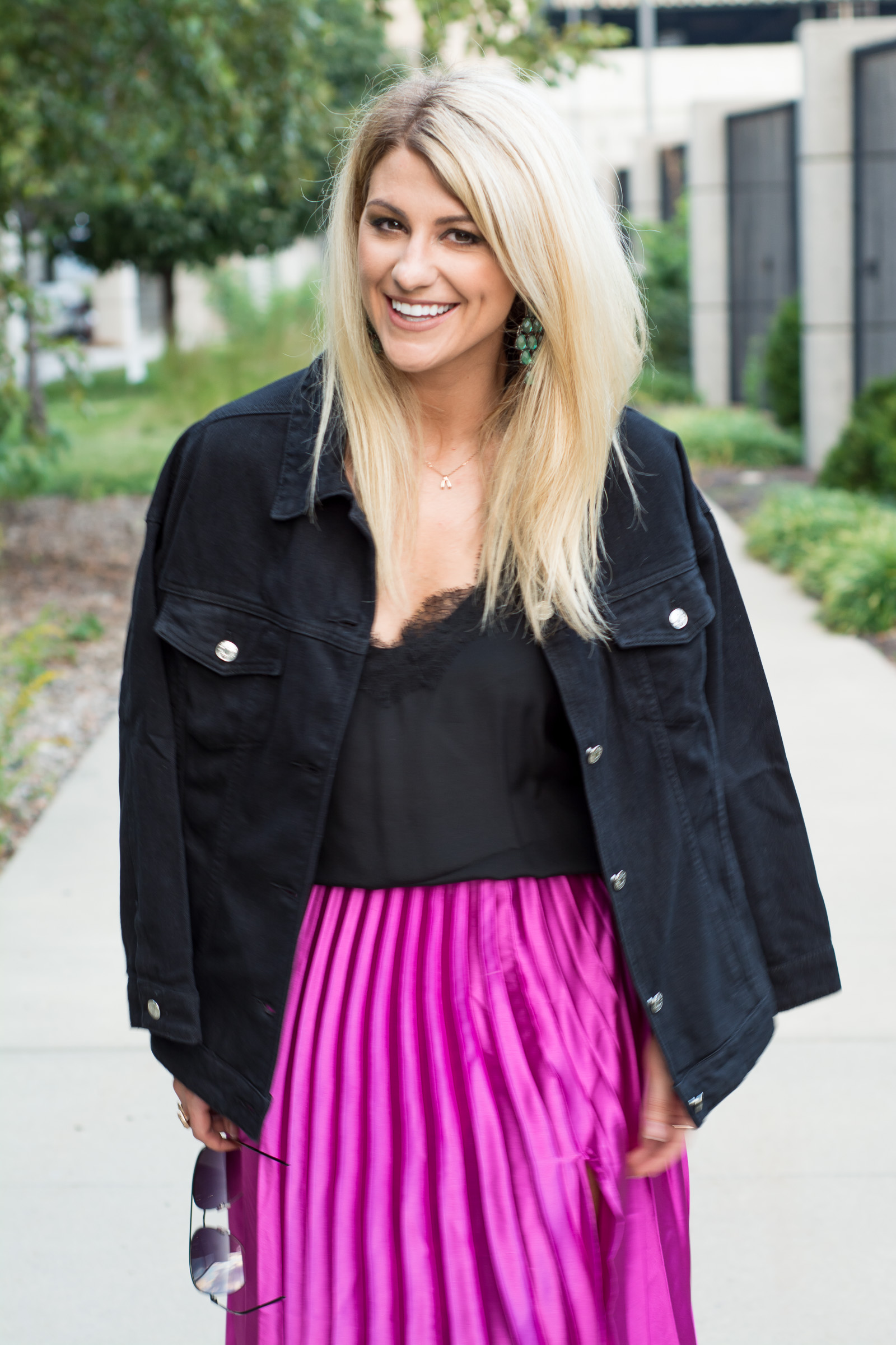 Fuchsia Pleated Midi Skirt + Black Denim Chain Jacket. | Ashley from LSR