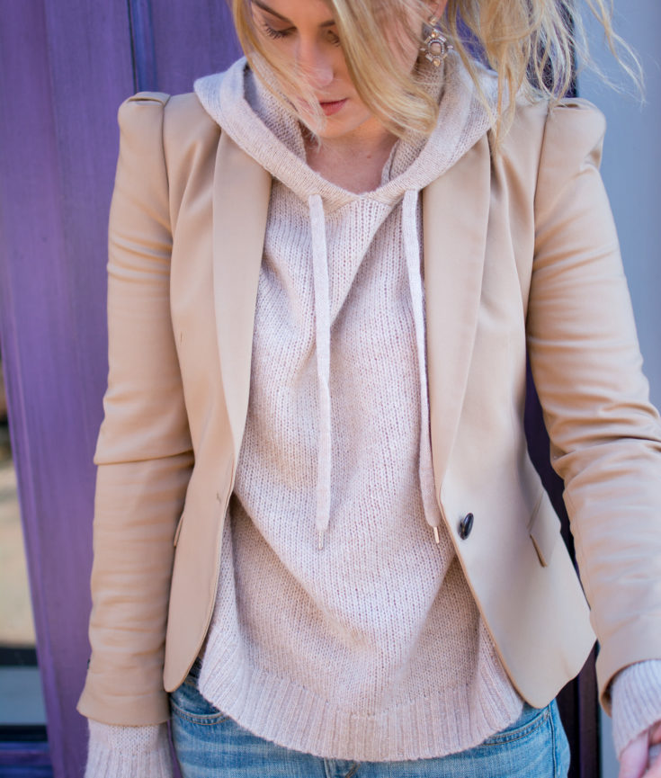 Ashley from LSR in a camel blazer, boyfriend jeans, and blush hoodie