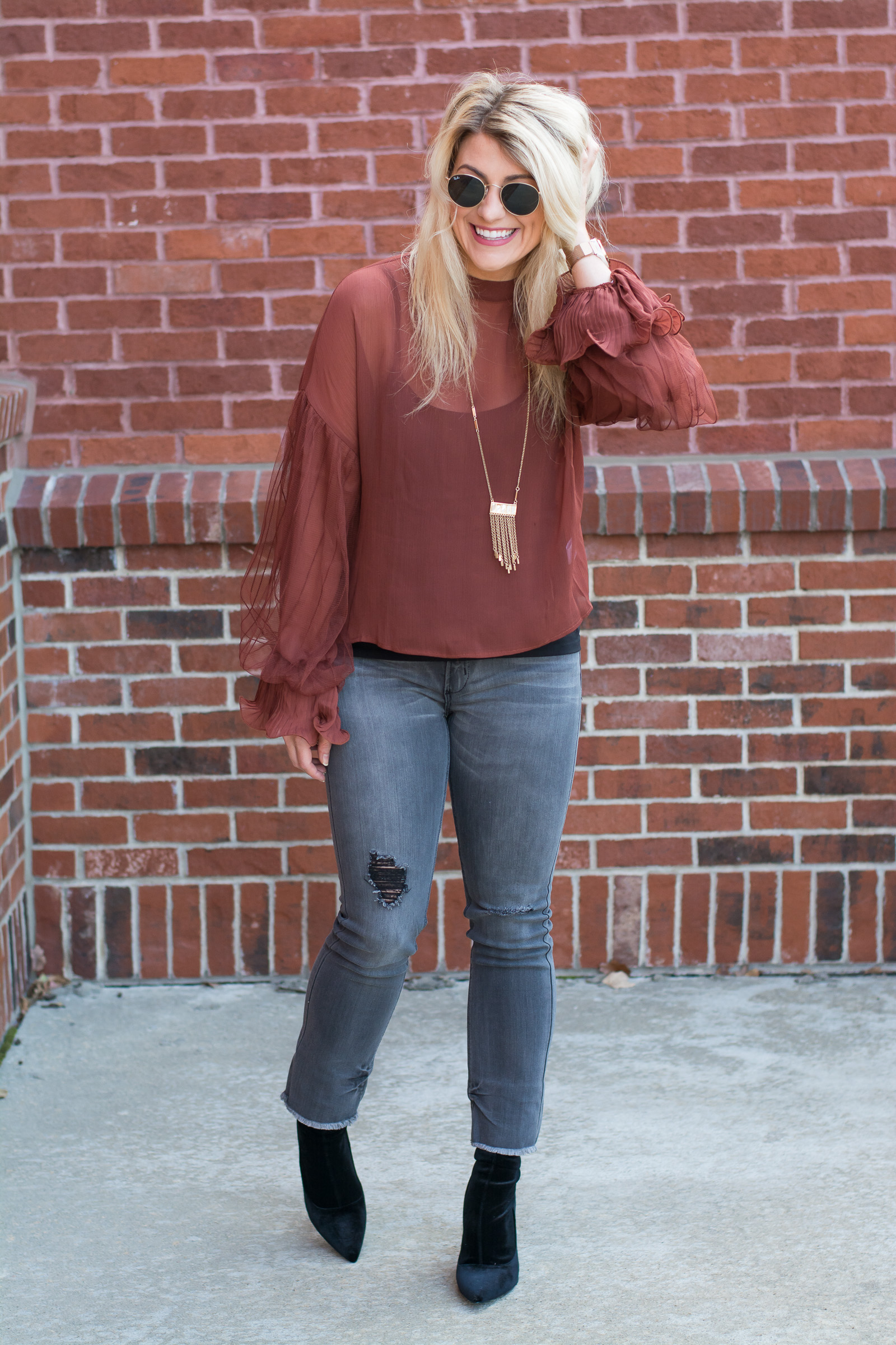 Casual Holiday Outfit: Rust Blouse + Gray Jeans. | Ashley from LSR