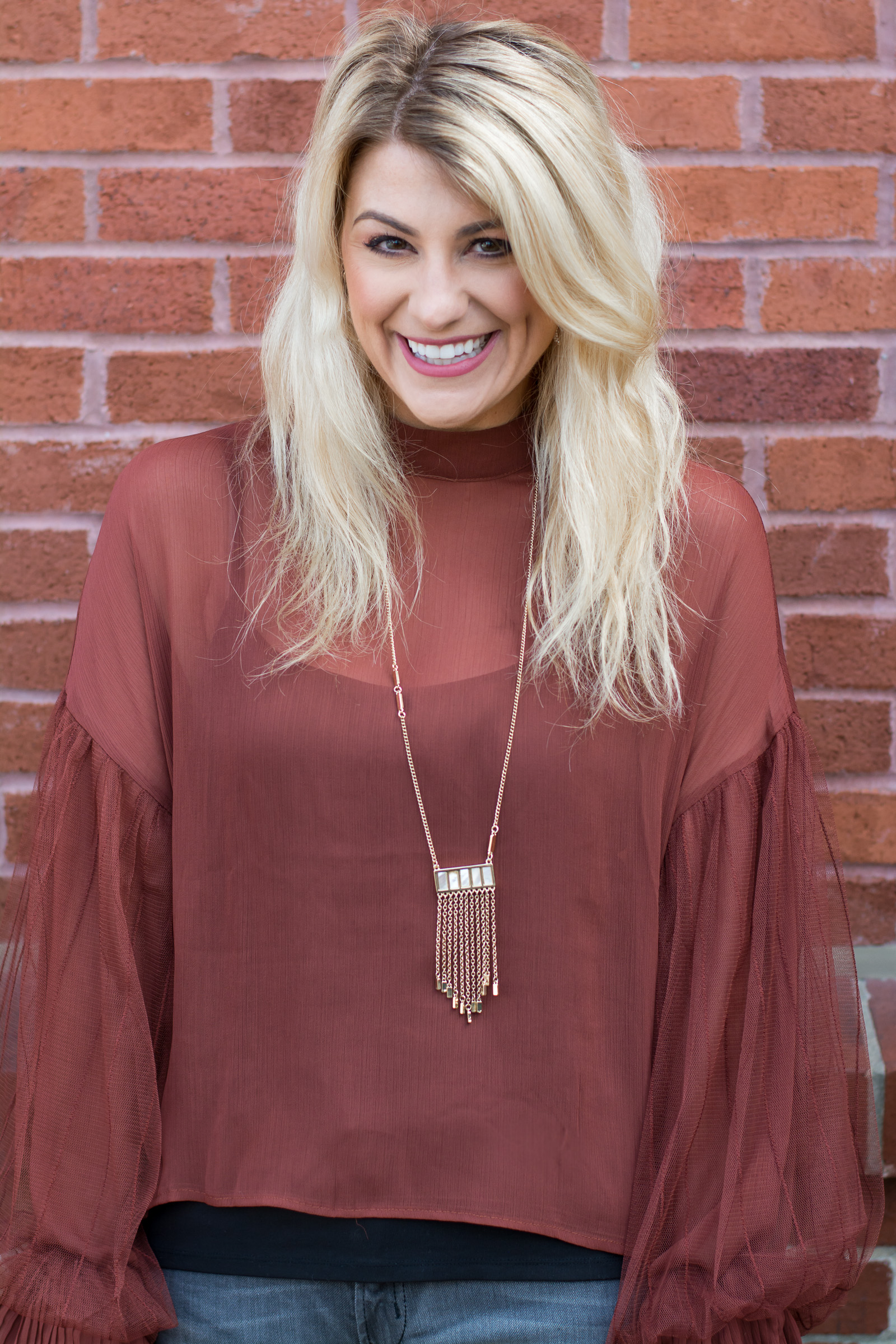 Casual Holiday Outfit: Rust Blouse + Gray Jeans. | Ashley from LSR